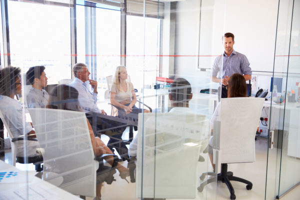 meeting in a glass wall room